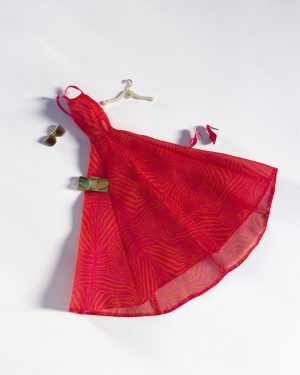 Flat lay of Couture Flame doll fashion dress accessories and heels