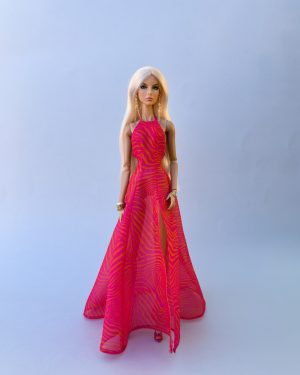 Editorial side view of Couture Flame doll couture look