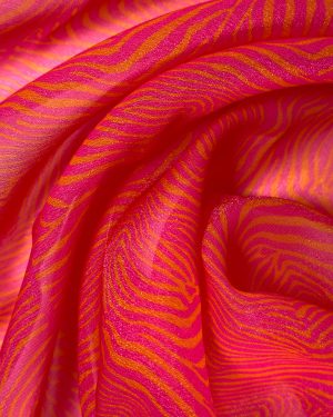 Detalle del tejido zebra rosa y naranja utilizado en el vestido Couture Flame